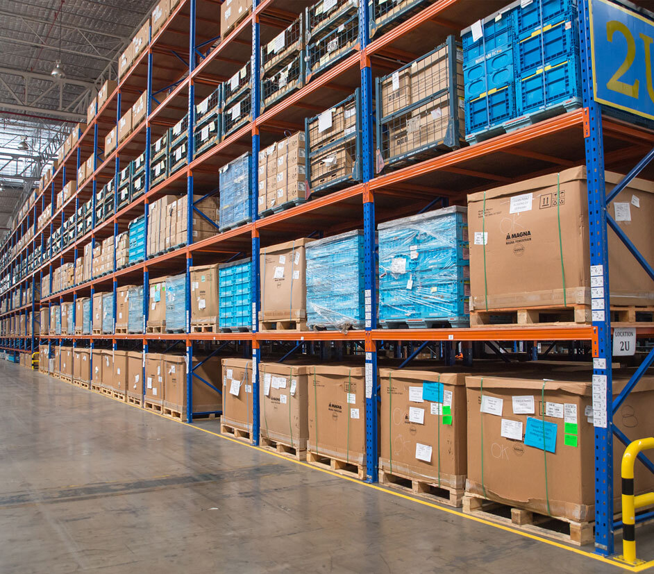 Tall racks of pallets and packing boxes