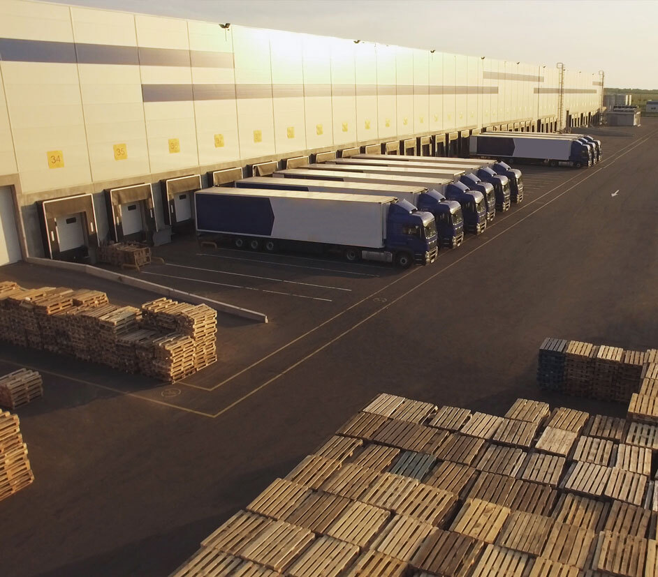 Aerial view of warehouse and semi-trucks